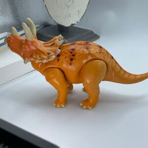 Playmobil orange Triceratops dinosaur figure. Posable.
